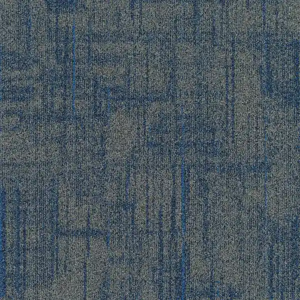 Blue-gray nylon carpet texture with abstract streaks of deep blue