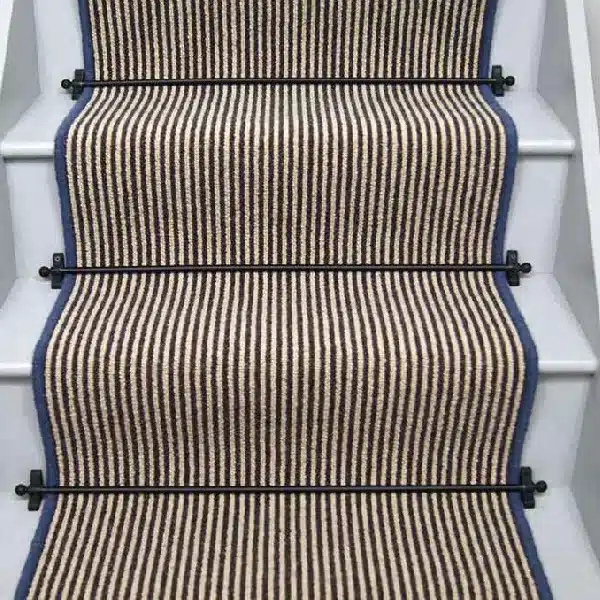 Hardy striped wool stair runner with blue edging and black stair rods. (1)