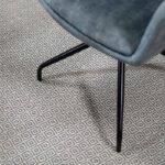 Luxury grey textured carpet rolls for modern living room flooring in Dubai.