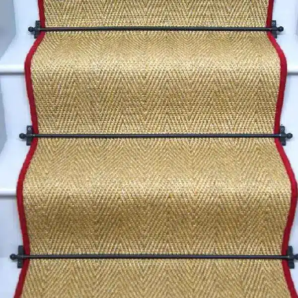 Oatmeal herringbone sisal stair runner with red edging and black stair rods. (1)
