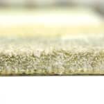 Premium thick pile carpet rolls with durable backing for luxury flooring in Dubai.