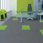 Professional grey carpet tiles with lime green accents for modern office cabins and workspaces in Dubai.