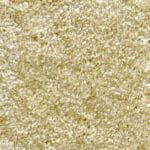 Soft beige carpet rolls with plush texture for home flooring in Dubai.