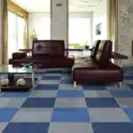 Stylish blue and grey checkered carpet tiles for modern living room and luxury home interiors in Dubai.