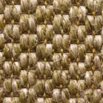 chunky woven sisal carpet with natural gold and brown fibers for durable luxury flooring in Dubai.