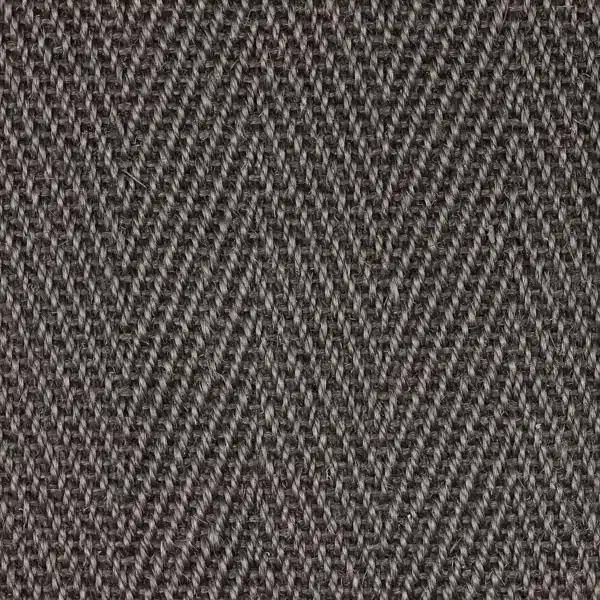 dark gray sisal carpet with herringbone weave pattern.