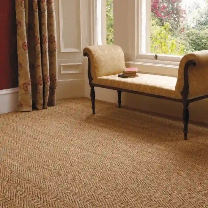 Honey-colored sisal runner rug with black borders
