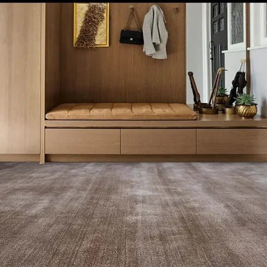Neutral brown carpet rolls